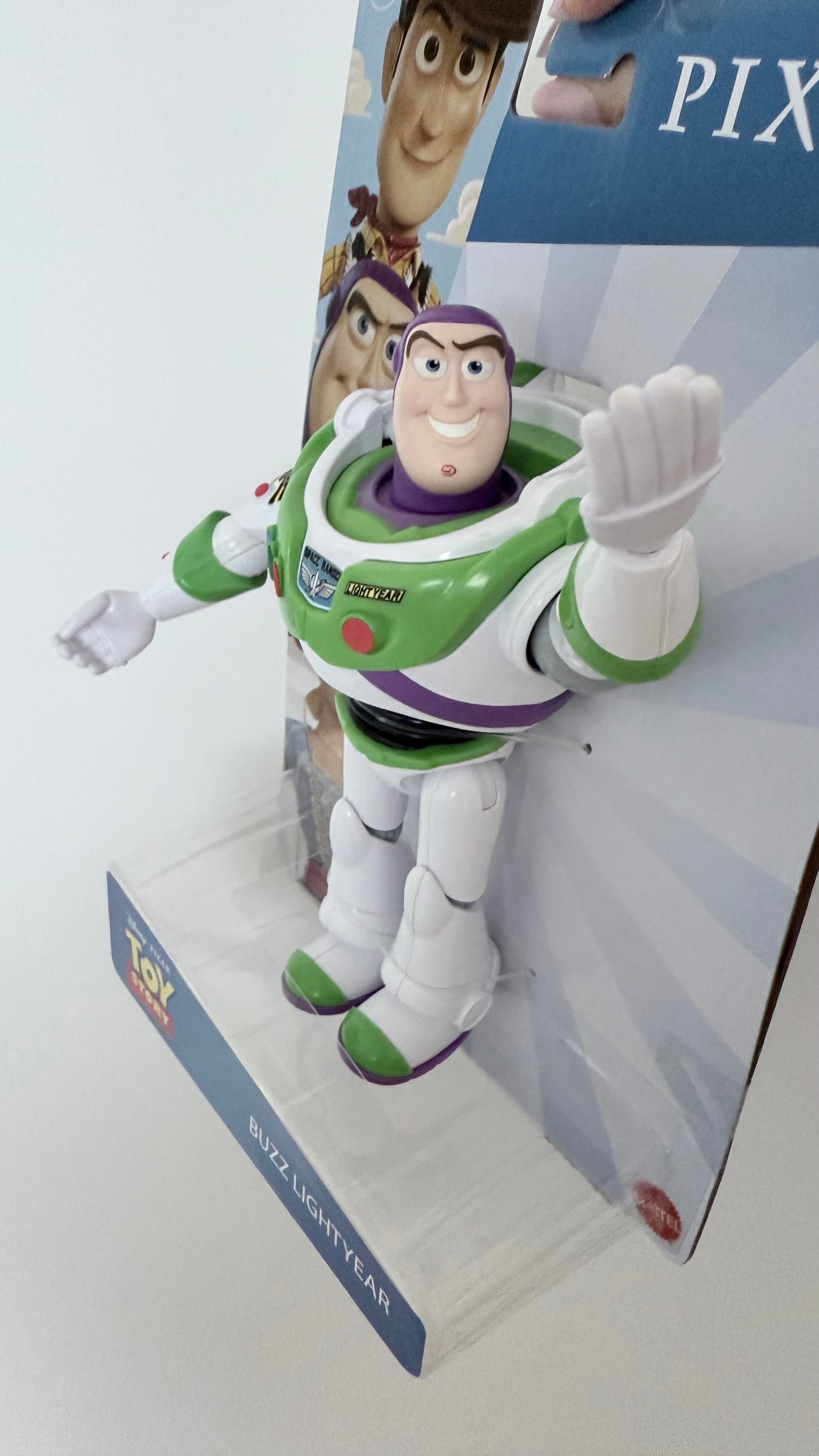 Mattel Disney Pixar Toy Story Action Figure, Posable Buzz Lightyear in Signature Spacesuit Look, Collectible Toy, 7-inch